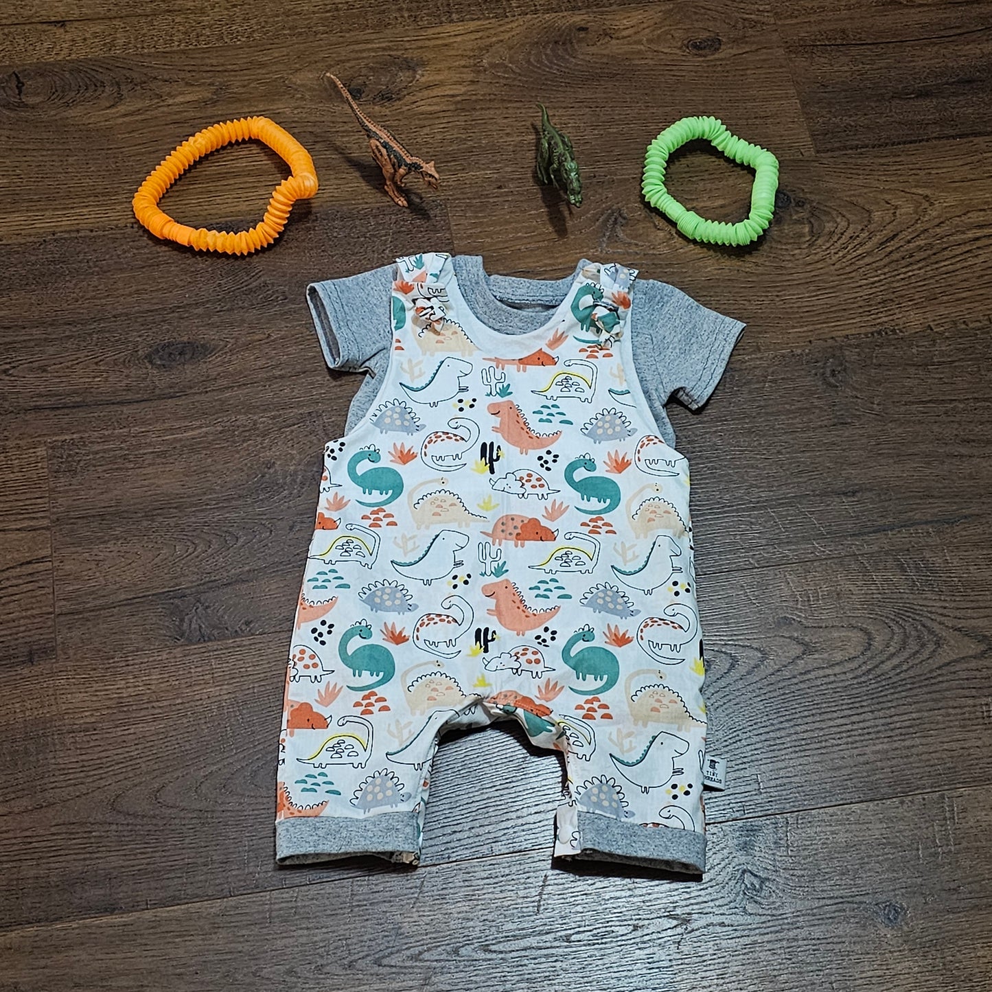 Sleeveless romper with onsie. Size 6-9 months